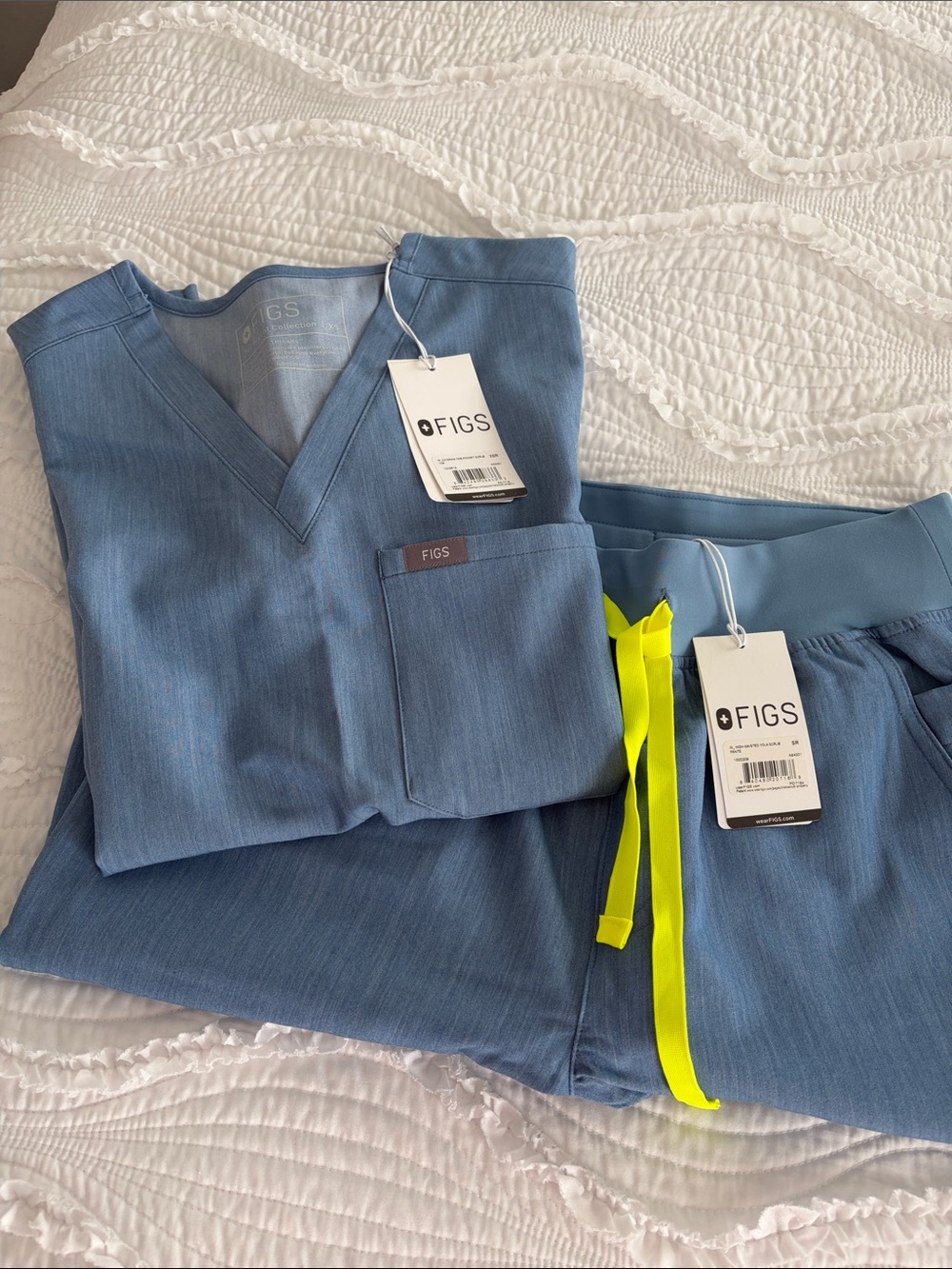 Figs Dusty Blue Scrub Top & Jogger Set with Neon Yellow Drawstring.